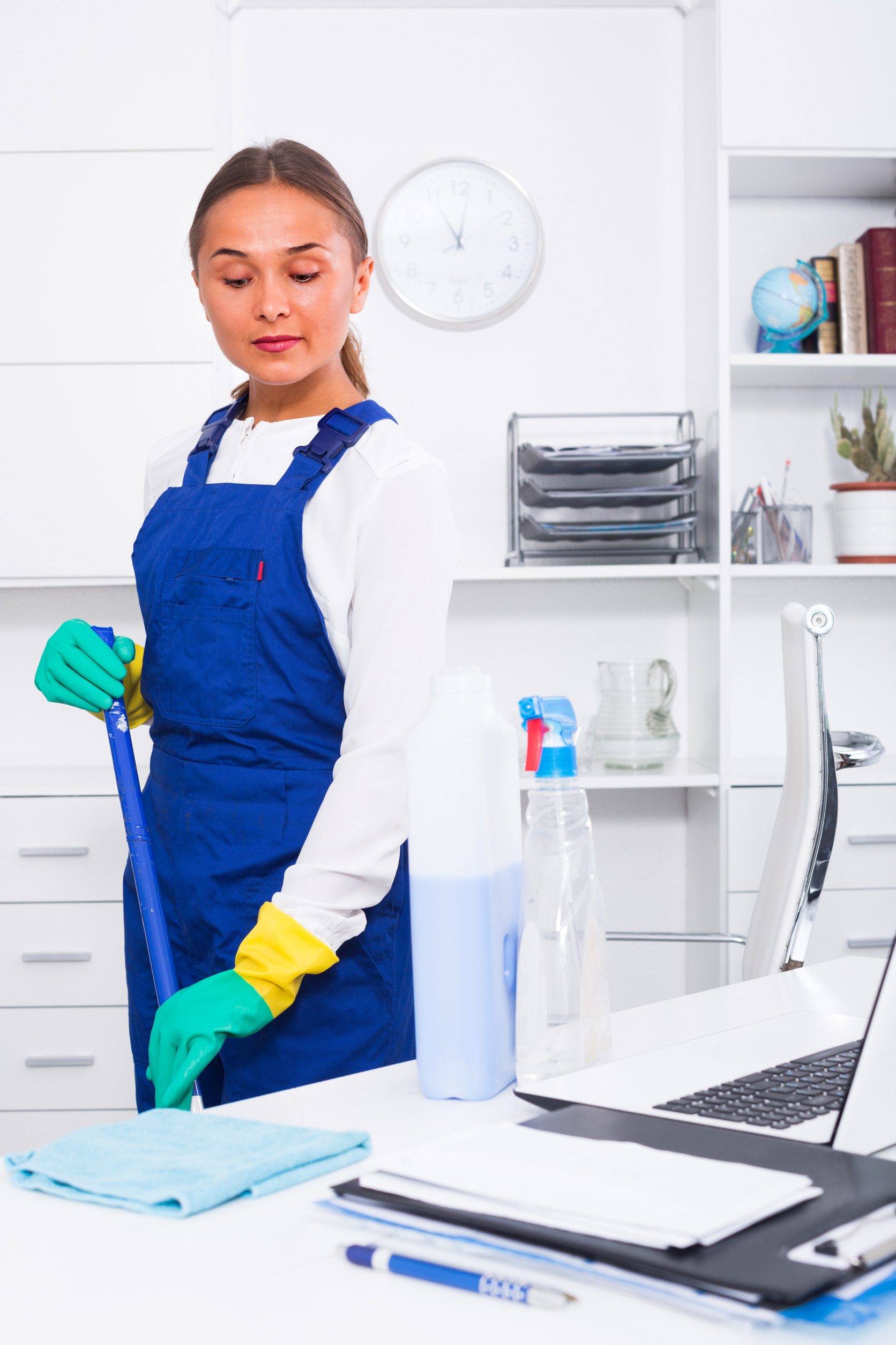 woman cleaning a medical office woman cleaning a medical office